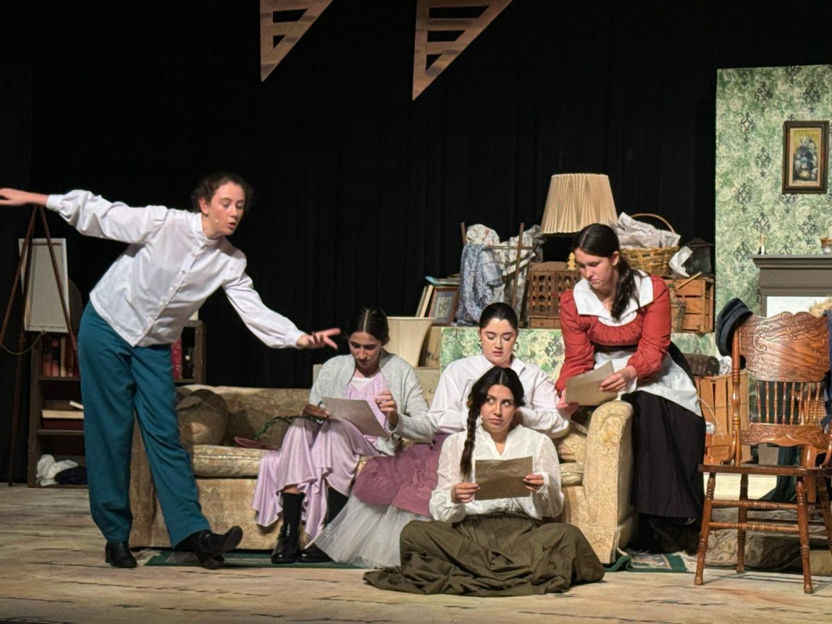 Junior Sienna Young, Junior Luis Moran, Senior Sage Moreno, Senior Stephanie Nunez and Junior Riley Devan pretend to act out a play that the character Jo has written. 